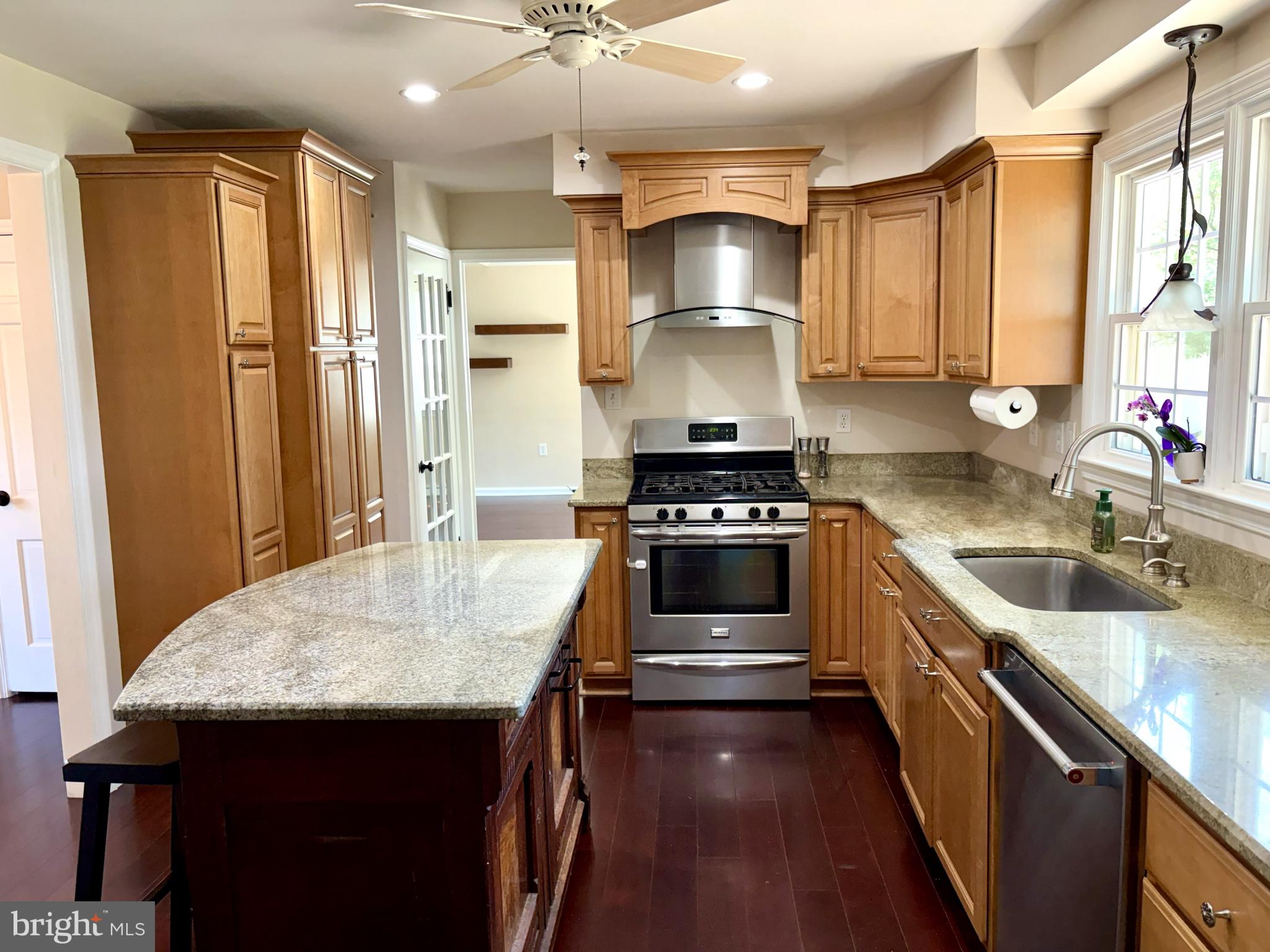 1323 Tulane Road Wilmington, DE 19803 - Photo 9 of 28 a kitchen with stainless steel appliances a stove refrigerator sink and cabinets