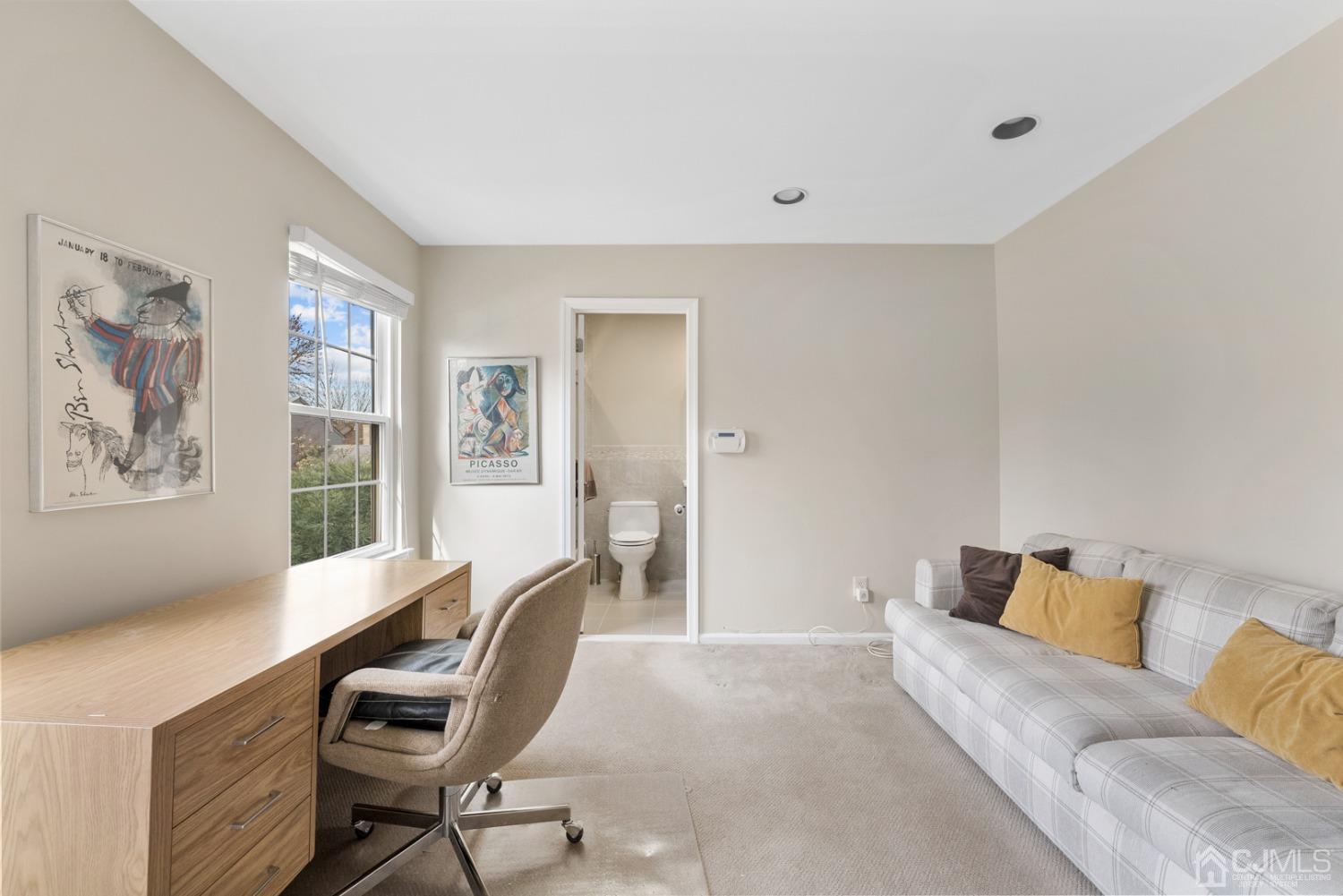504 Maplecrest Road Edison, NJ 08820 - Photo 17 of 19 a living room with furniture and a window