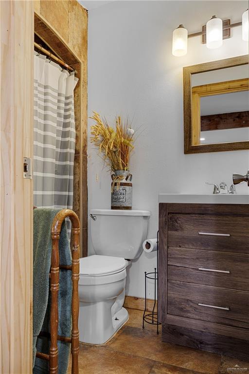 32447 Farm To Market Road 2925 Rio Hondo, TX 78583 - Photo 13 of 25 Bathroom with vanity and toilet