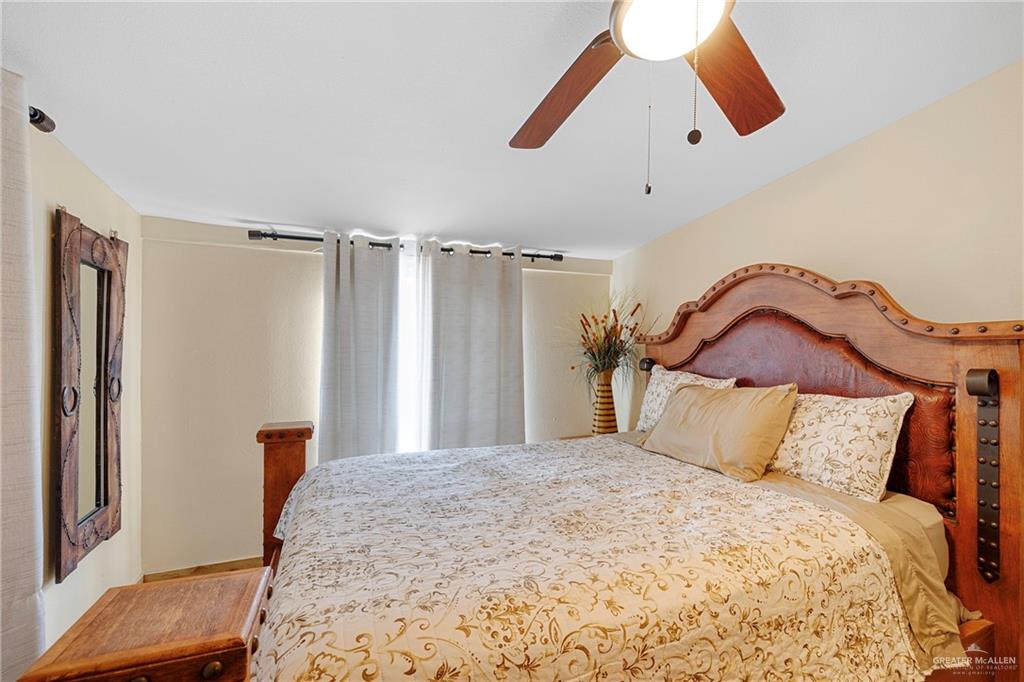 32447 Farm To Market Road 2925 Rio Hondo, TX 78583 - Photo 7 of 25 Bedroom with a ceiling fan