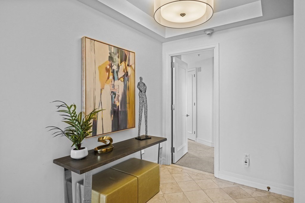 1 Avery Street, Unit U19D Boston, MA 02111 - Photo 11 of 27 a vase of flowers sitting on a table