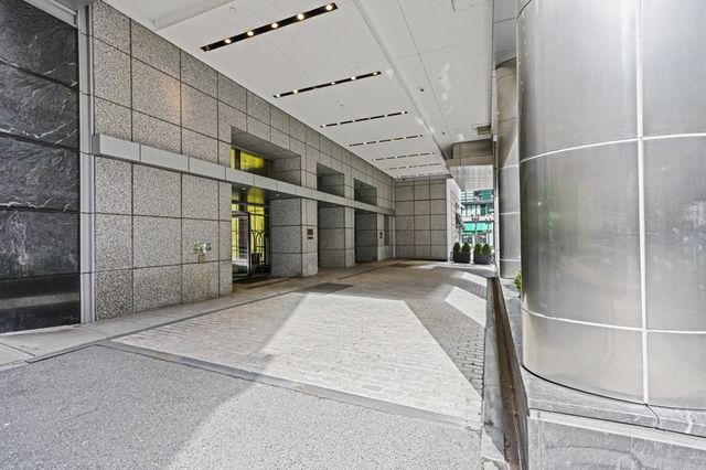 a view of a building and a street