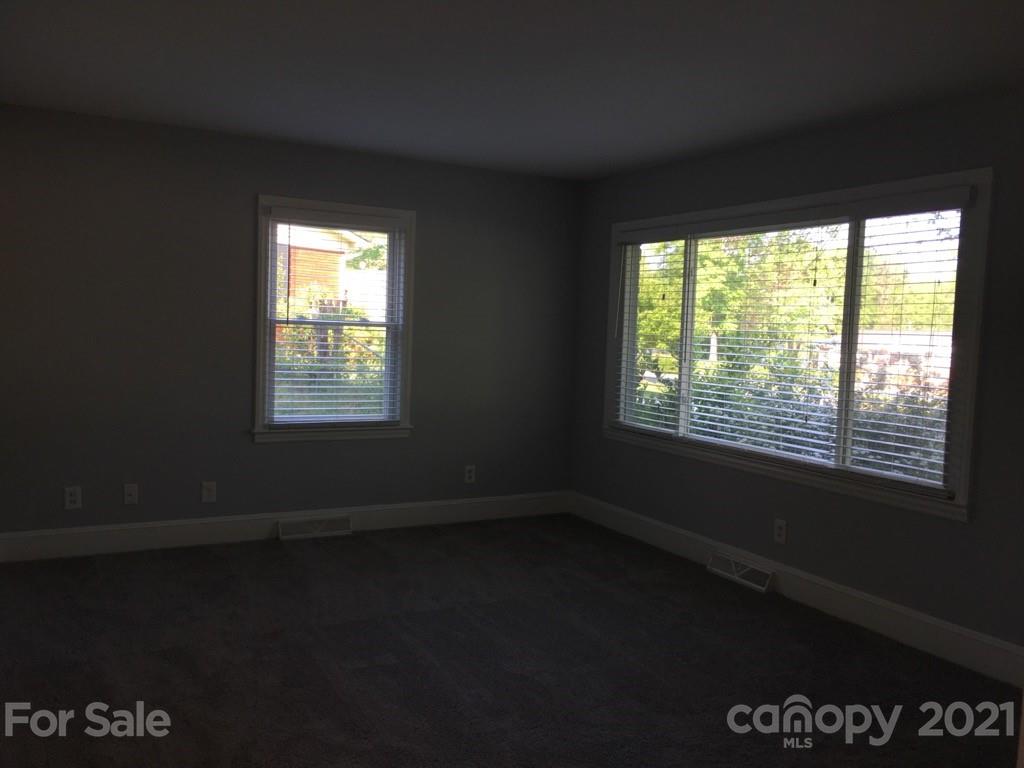 3633 Kempton Place Charlotte, NC 28208 - Photo 12 of 32 a view of an empty room with a window