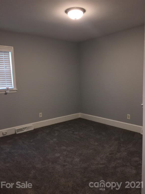 3633 Kempton Place Charlotte, NC 28208 - Photo 17 of 32 a view of an empty room