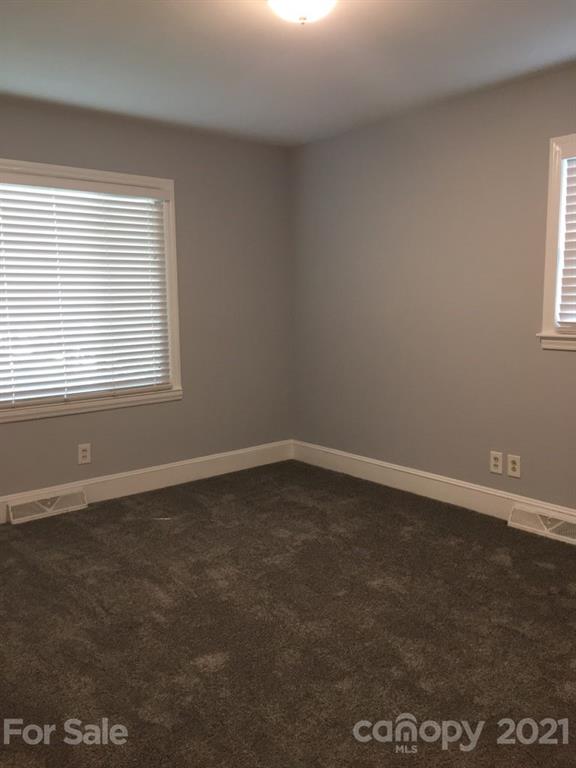3633 Kempton Place Charlotte, NC 28208 - Photo 20 of 32 an empty room with a window