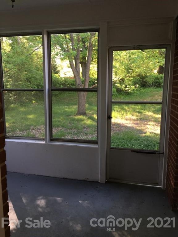 3633 Kempton Place Charlotte, NC 28208 - Photo 29 of 32 a living room with large window