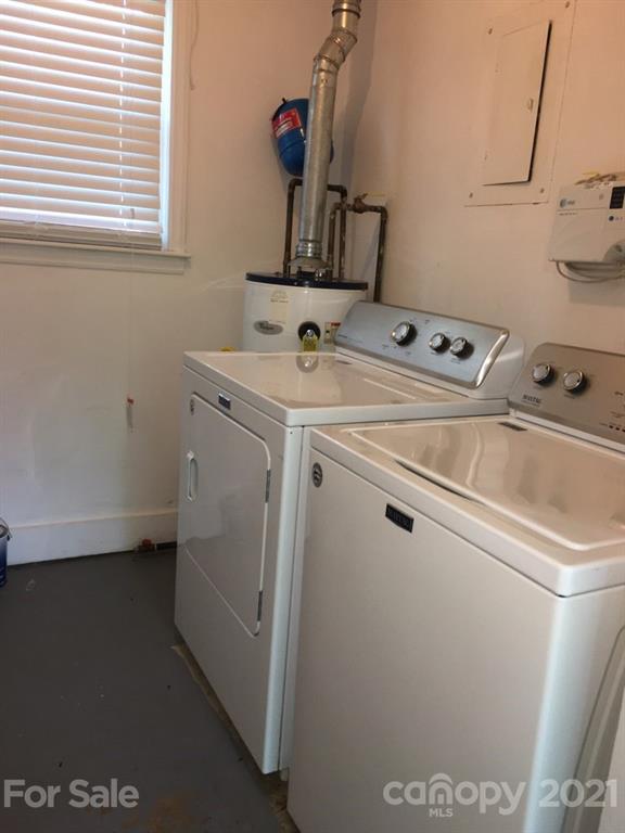 3633 Kempton Place Charlotte, NC 28208 - Photo 32 of 32 a utility room with dryer and washer