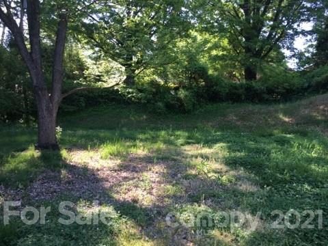 3633 Kempton Place Charlotte, NC 28208 - Photo 9 of 32 a view of a lake with a yard