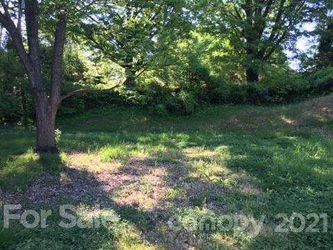 3633 Kempton Place Charlotte, NC 28208 - Photo 10 of 32 a view of a lake with a yard