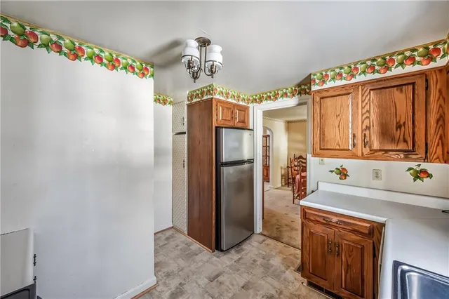 a bathroom with a sink a mirror and a shower
