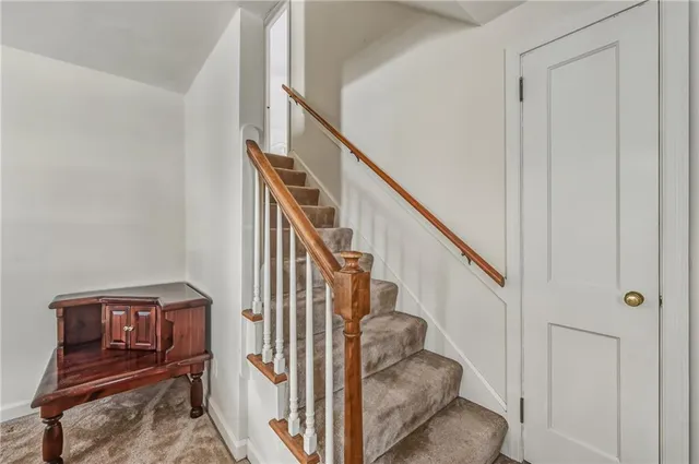 a view of entryway with wooden floor