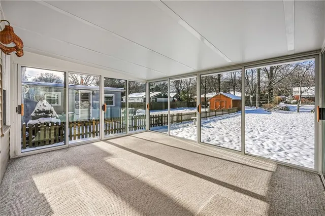 a view of a house with a backyard and balcony