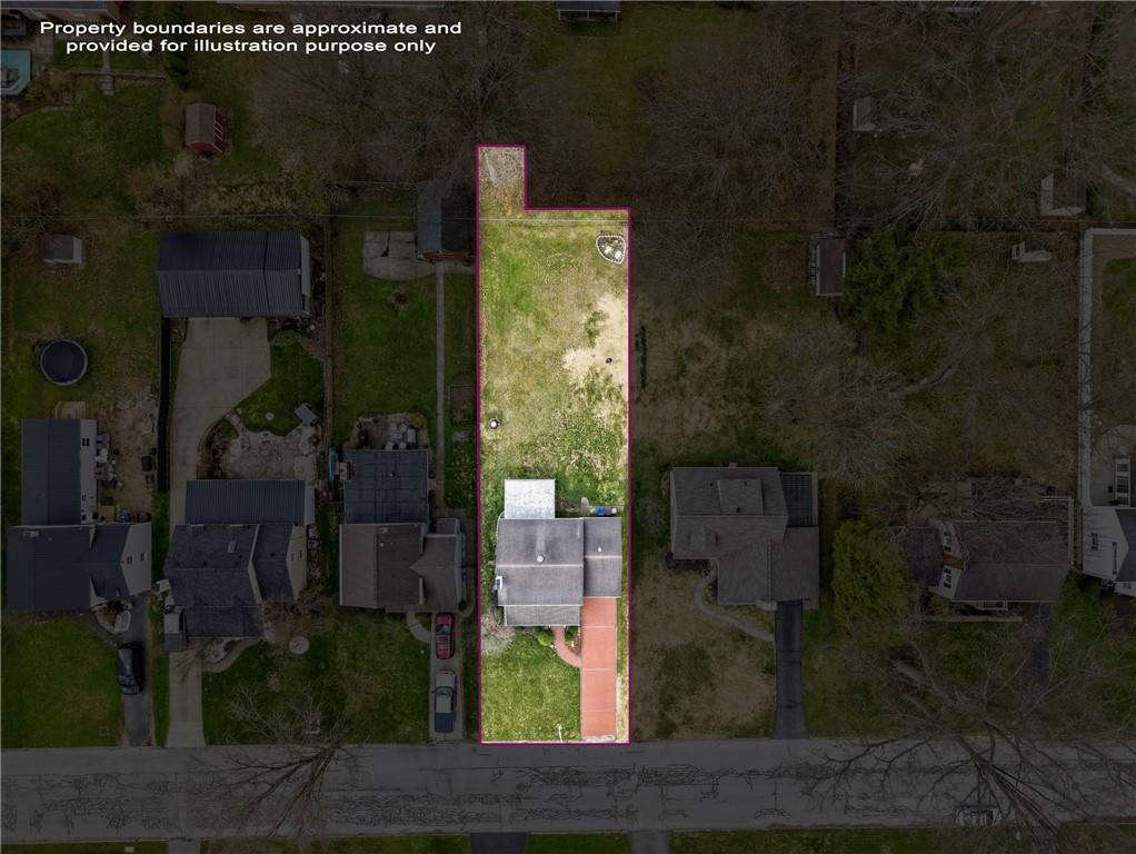513 Dougherty Avenue Sharon, PA 16146 - Photo 26 of 28 a small garden covered with tall trees