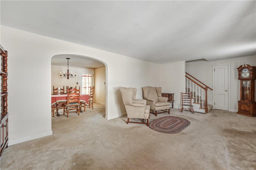 513 Dougherty Avenue Sharon, PA 16146 - Photo 7 of 28 a living room with furniture and a table