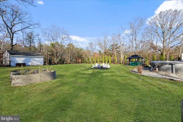 a view of a garden with an outdoor space