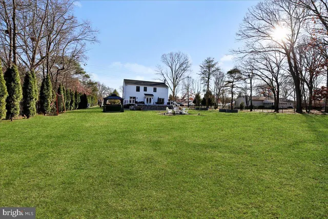 a front view of building with yard