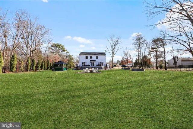 a view of outdoor space with deck and green space