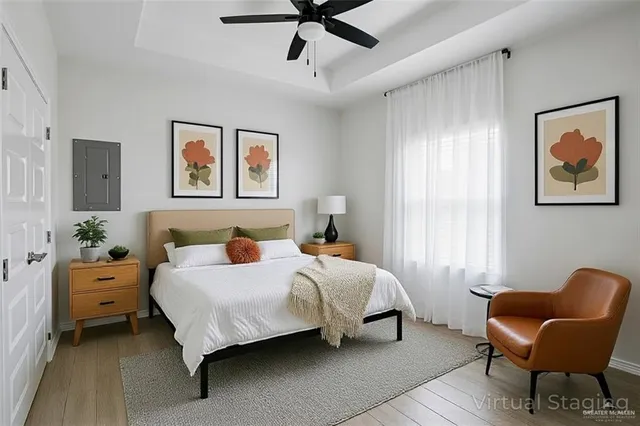 a bedroom with a bed and a window