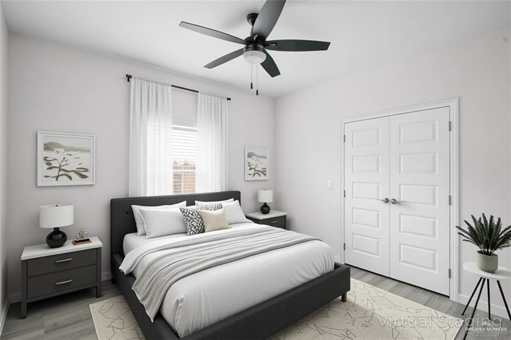1511 Playa Drive, Unit 2 Weslaco, TX 78596 - Photo 20 of 28 a bedroom with a bed and a window