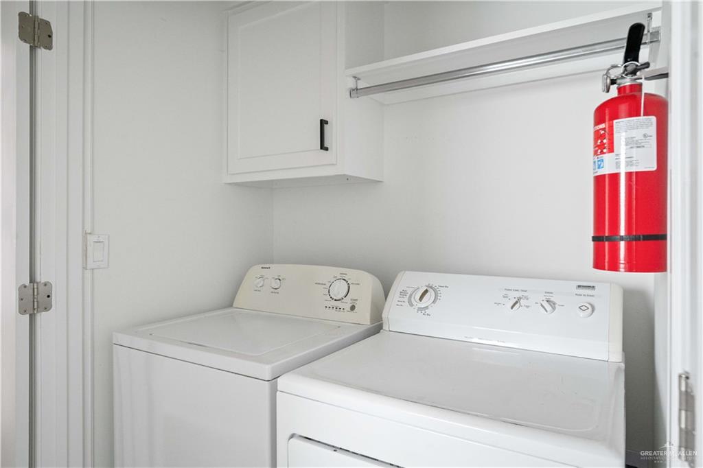 1511 Playa Drive, Unit 2 Weslaco, TX 78596 - Photo 22 of 28 a utility room with dryer and washer