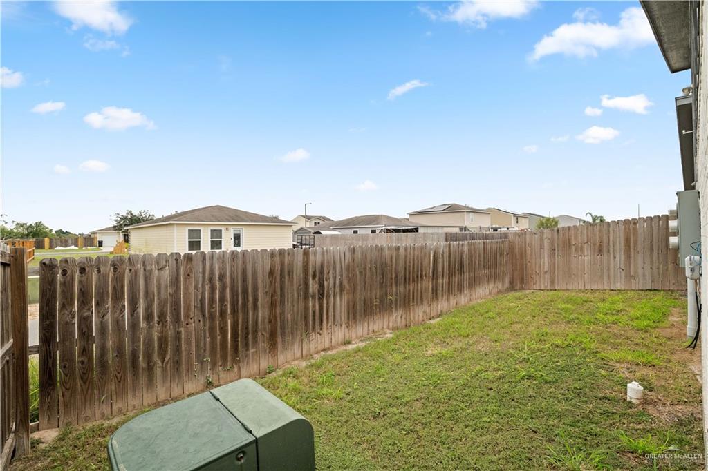 1511 Playa Drive, Unit 2 Weslaco, TX 78596 - Photo 24 of 28 a view of a backyard