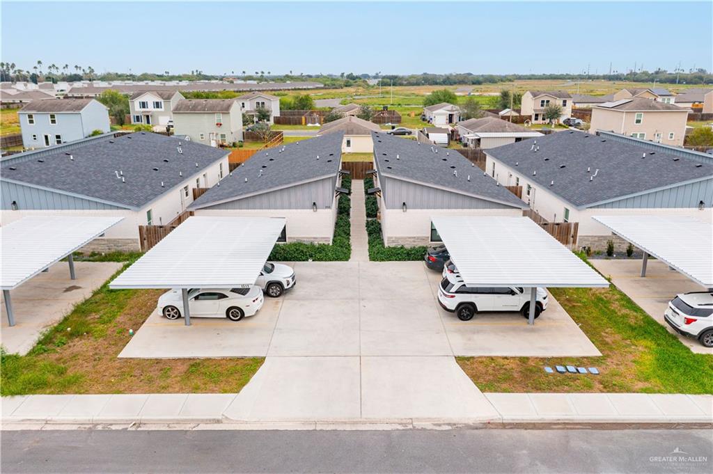 1511 Playa Drive, Unit 2 Weslaco, TX 78596 - Photo 25 of 28 a view of a city with lawn chairs