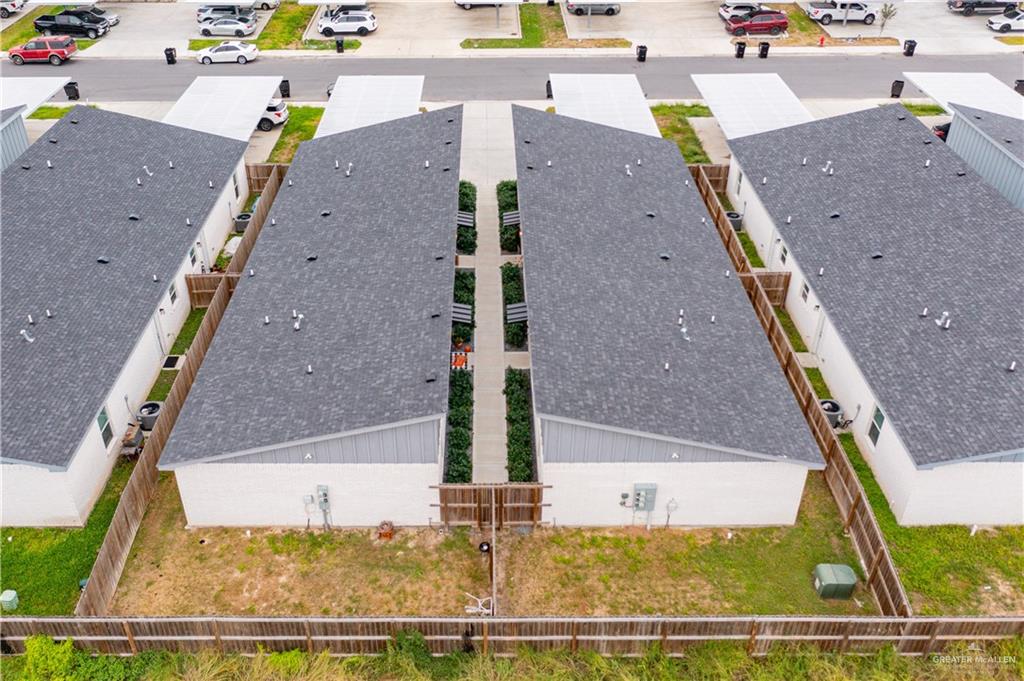 1511 Playa Drive, Unit 2 Weslaco, TX 78596 - Photo 27 of 28 an aerial view of a house with a yard