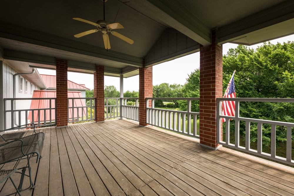 9554 David Fort Road Argyle, TX 76226 - Photo 31 of 35 a view of balcony with wooden floor