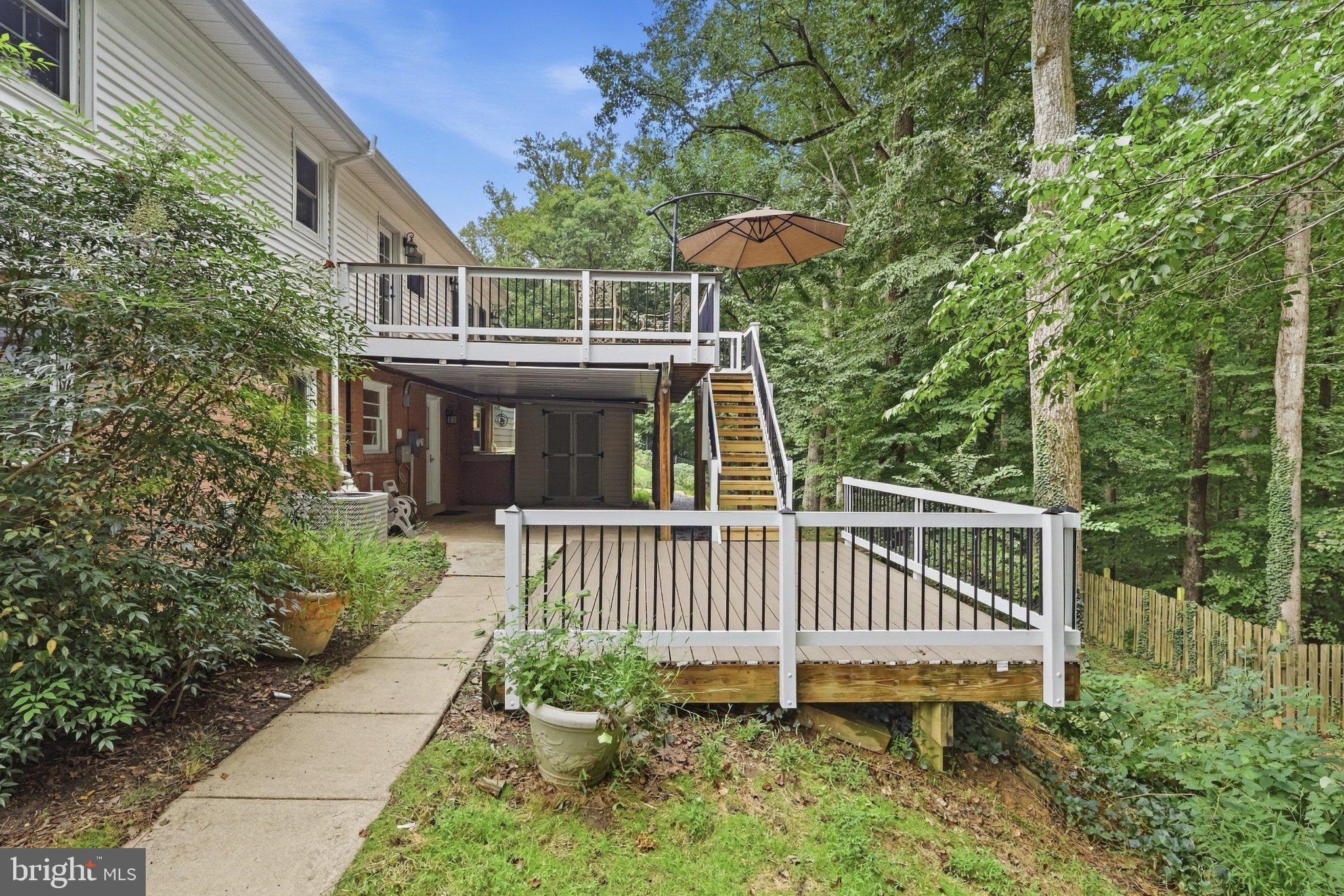 7113 Hadlow Court Springfield, VA 22152 - Photo 32 of 37 Lower deck and a covered patio