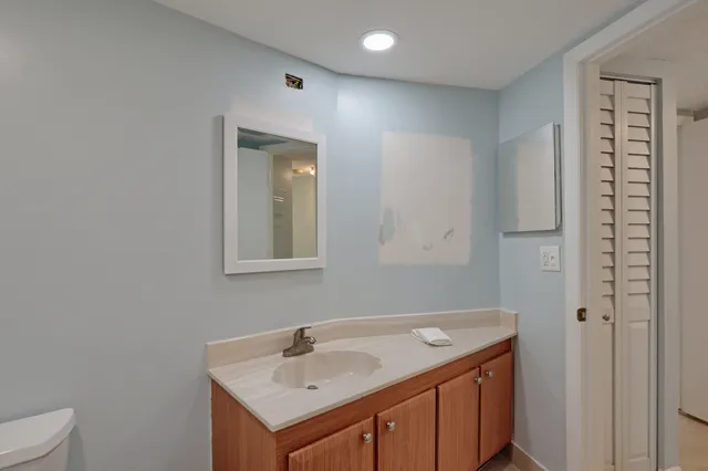 an aerial view of a house with a swimming pool yard and outdoor seating