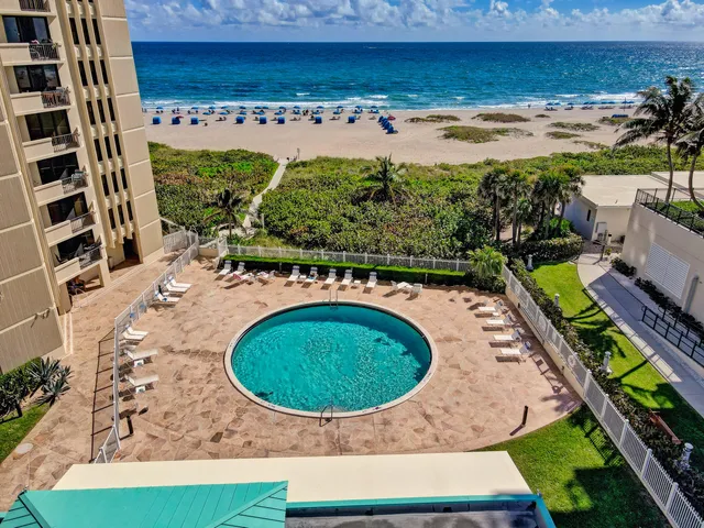 a front view of a building with outdoor space