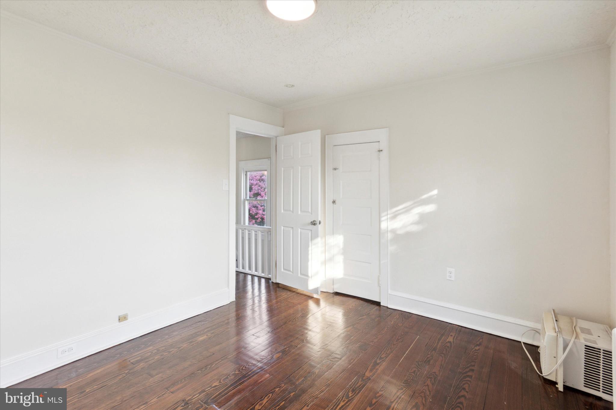 417 Garfield Avenue, Unit 2 Folcroft, PA 19032 - Photo 6 of 14 a view of an empty room with wooden floor
