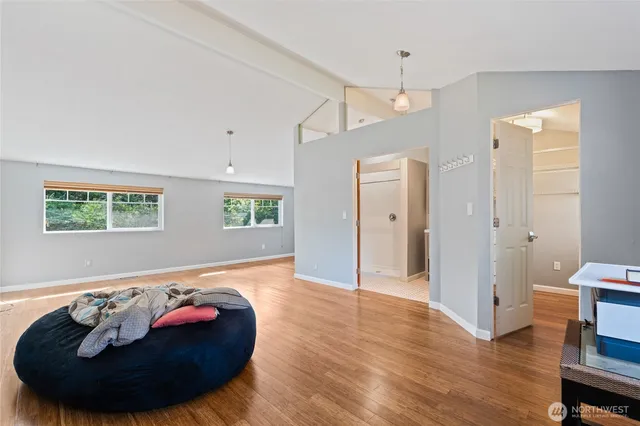 a view of a livingroom with furniture and wooden floor