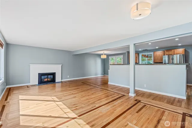 a bedroom with a bed and a fireplace