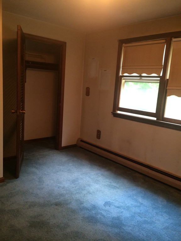 277 Fowler Road Northbridge, MA 01534 - Photo 13 of 14 an empty room with a window