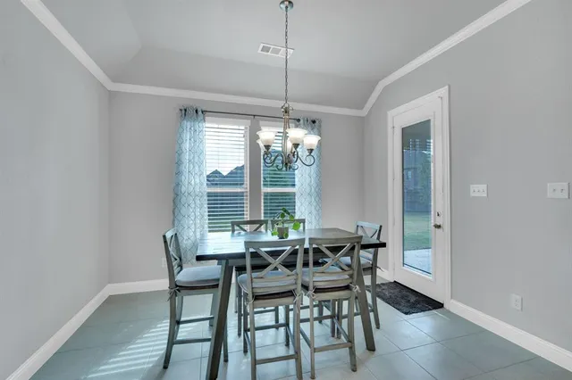 a kitchen with lots of counter top space and living room