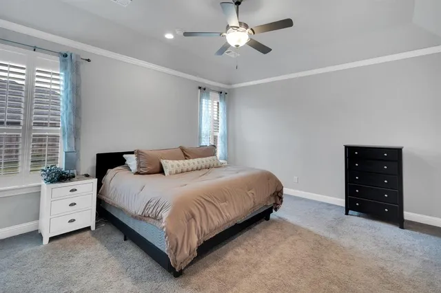 a view of a dining room with furniture window and chandelier