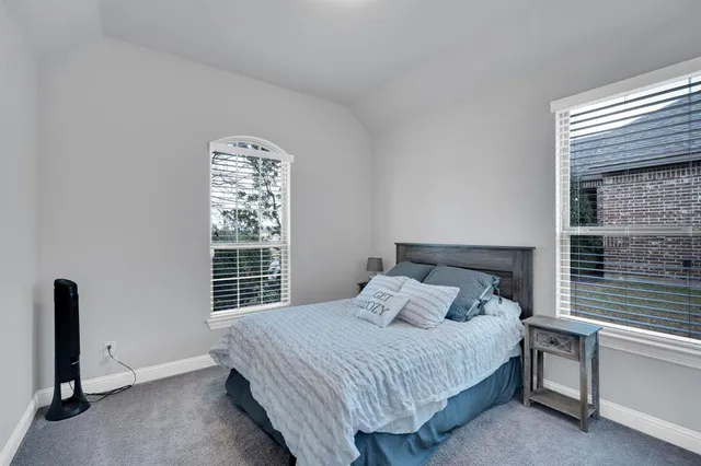 a view of a storage & utility room with two washing machine