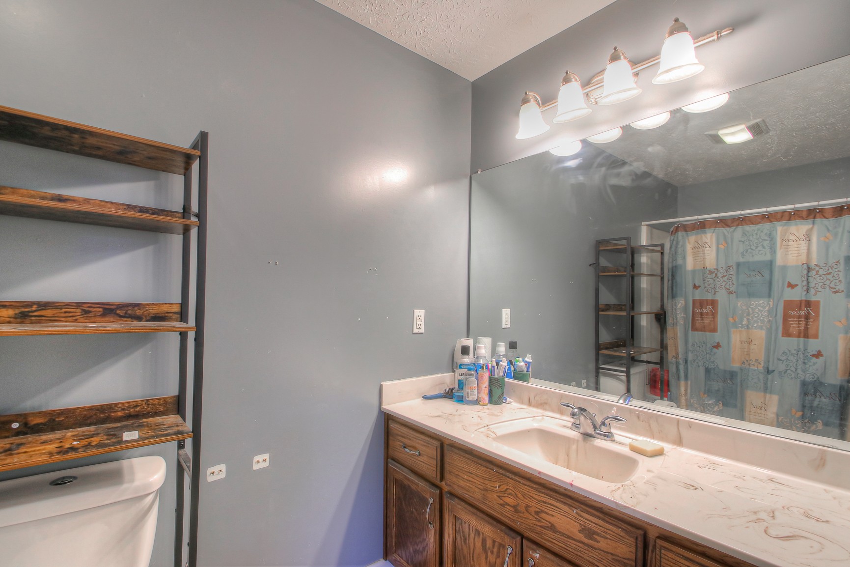 5176 Hugh Woodard Road Springfield, TN 37172 - Photo 8 of 23 a bathroom with a sink double vanity and a mirror