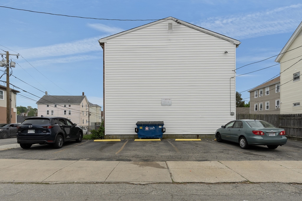 70 North Court Street, Unit F Fall River, MA 02720 - Photo 20 of 20 a car parked in front of a house