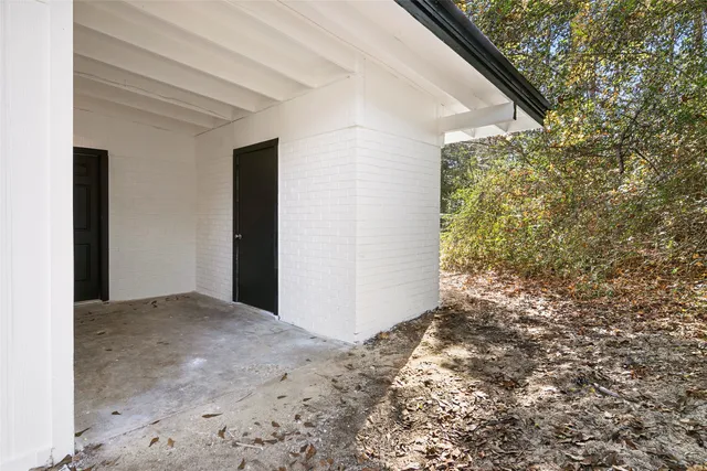 a view of a yard with a tree