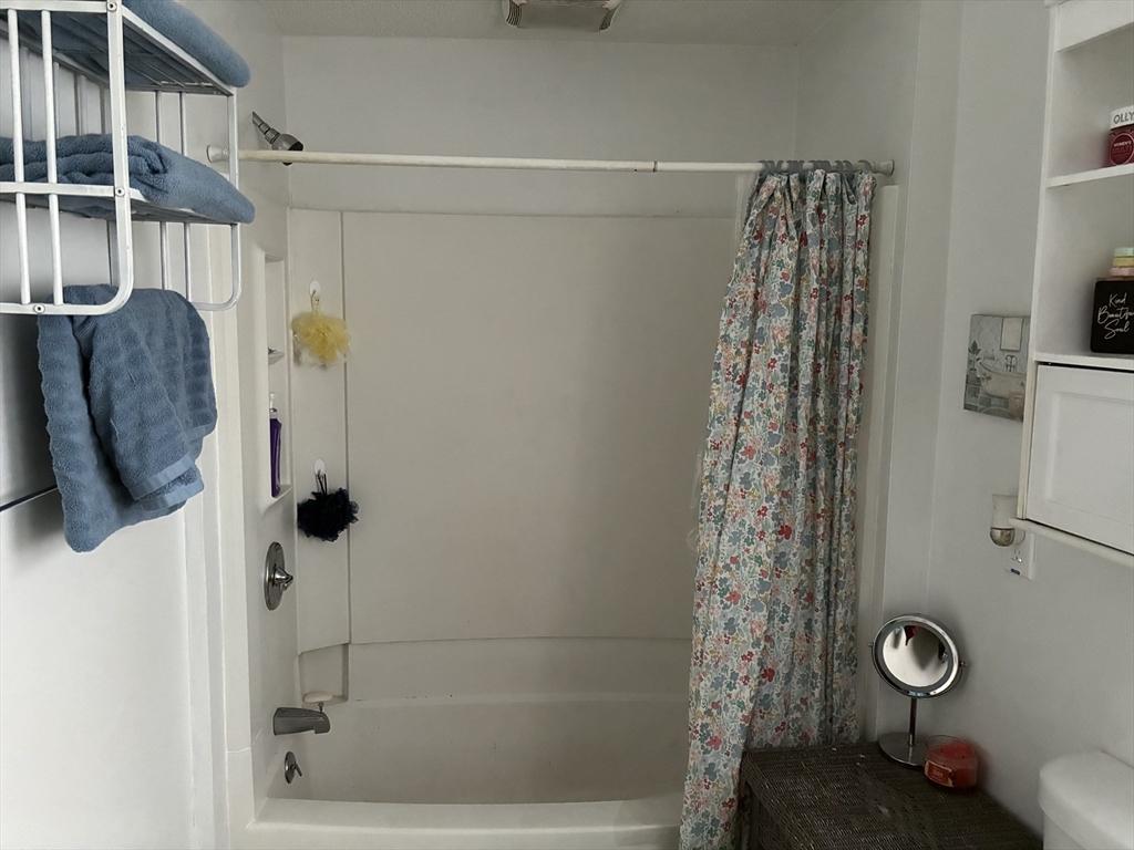89 Worcester Street Southbridge, MA 01550 - Photo 15 of 18 a bathroom with a shower