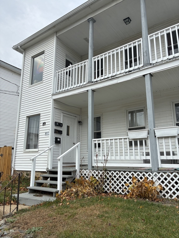89 Worcester Street Southbridge, MA 01550 - Photo 2 of 18 a front view of a house with a large window