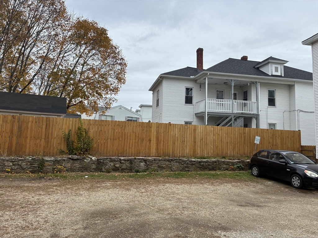 89 Worcester Street Southbridge, MA 01550 - Photo 7 of 18 a front view of a house with a yard