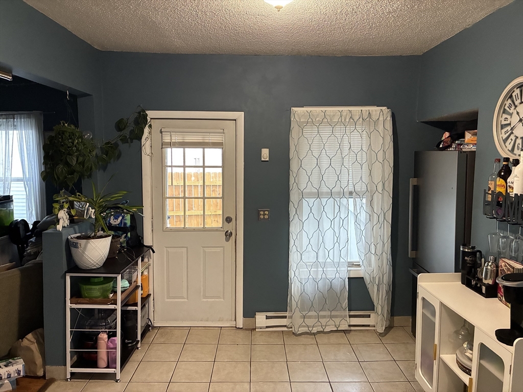 89 Worcester Street Southbridge, MA 01550 - Photo 10 of 18 a room with furniture and a window