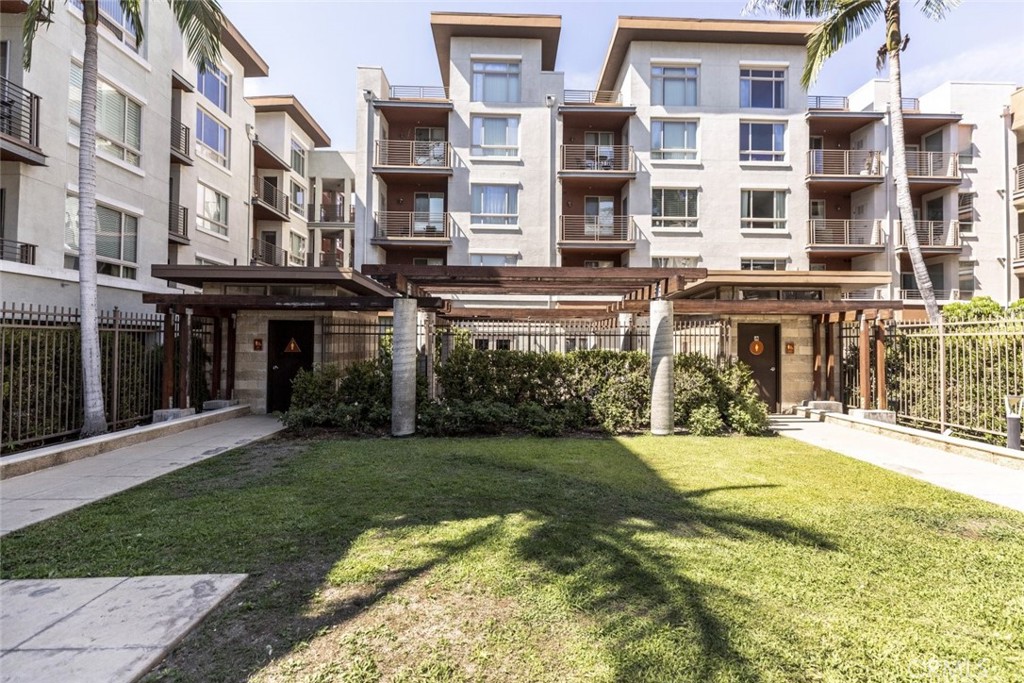 100 South Alameda Street, Unit 353 Los Angeles, CA 90012 - Photo 2 of 60 a view of a building with a yard