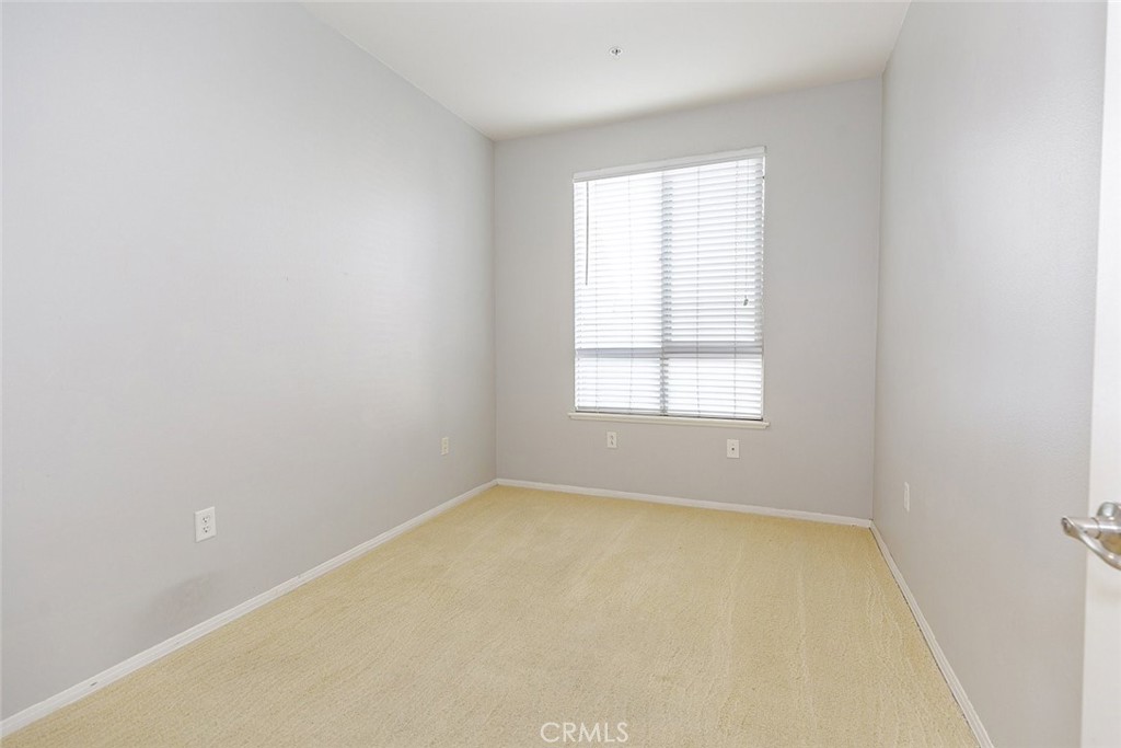 100 South Alameda Street, Unit 353 Los Angeles, CA 90012 - Photo 25 of 60 an empty room with a window
