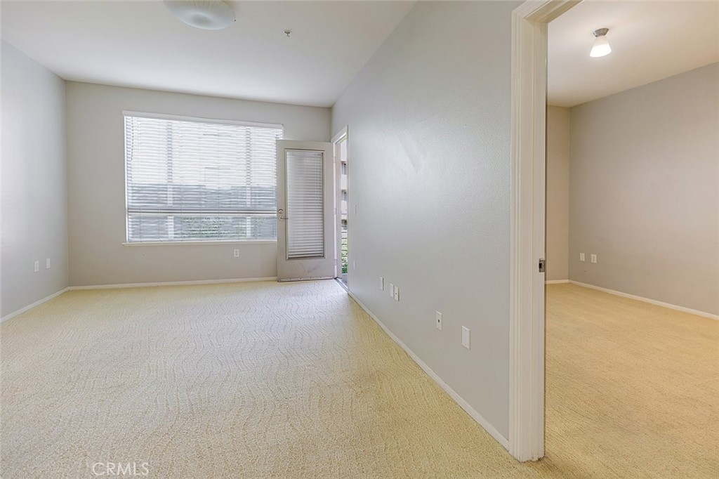 100 South Alameda Street, Unit 353 Los Angeles, CA 90012 - Photo 27 of 60 an empty room with windows