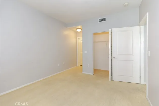 a kitchen with a table and chairs in it