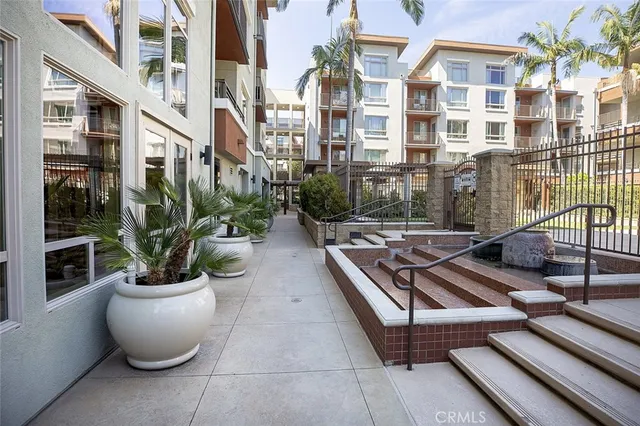 a lobby with furniture and rug